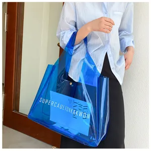 Stylish large capacity transparent blue PVC jelly tote bag with white minimalist text