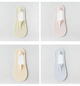 Details view of women's solid color ice silk invisible boat socks in four color options.