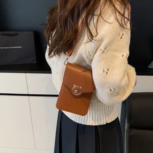 Elegant minimalist brown crossbody mobile phone bag with a cute cat-shaped metal clasp