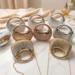 Detailed view of luxury rhinestone-embellished evening clutch bags in multiple colors