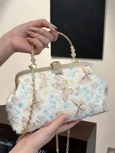 Elegante Abendtasche mit feiner Schmetterlingsstickerei und Luxus-Strassverschluss