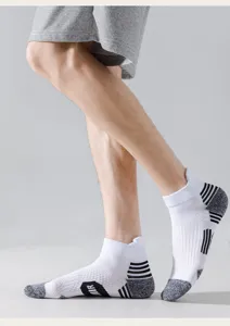 Detailed view of men's athletic sports short socks featuring breathable towel sole and grip.
