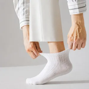 Men's white short crew socks, breathable solid color cotton dress socks for summer daily wear.
