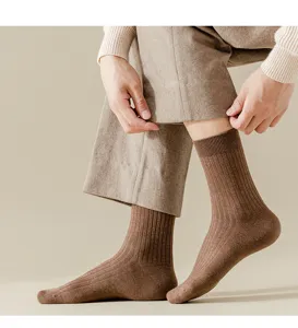 Men winter wool ribbed mid-calf socks detailed view, warm brown knitted casual daily wear.