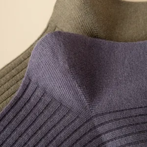 Men's wool ribbed winter mid-tube socks close up showing thick texture and warm knit design.