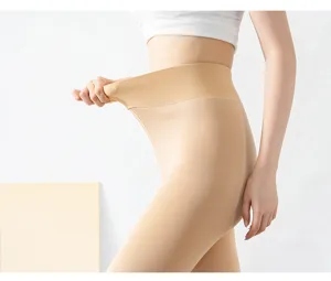 Detailed view of high-waisted fleece lined thermal leggings, skin color, stretchy fit.