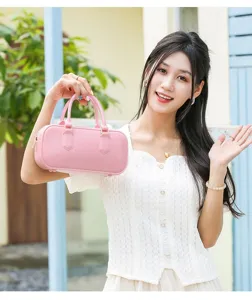 Elegante bolso de mano Boston rosa de gelatina para mujer, ideal para looks diarios