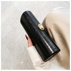 Vintage style black crocodile pattern baguette bag with elegant gold clasp for evening parties