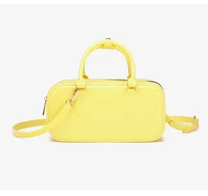 Bolso de mano Boston moderno de gelatina amarilla con asas y correa de hombro ajustable