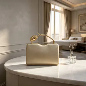 Elegant champagne gold evening clutch bag with creative rose flower branch metal handle