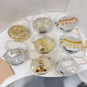Detailed close-up showing various acrylic evening box bags with pearls and rhinestones.