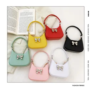 Detail showing a colorful collection of fashionable PVC jelly bags with elegant bow accents