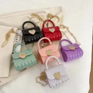 Collection of colorful mini PVC jelly bags with heart clasps and gold chains