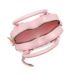 Elegante borsa a mano in PVC trapuntato rosa con manici superiori e chiusura a zip