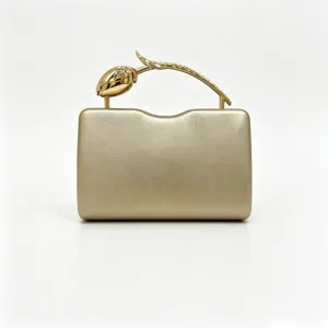 Elegant gold evening clutch bag with a unique rose stem handle for weddings and parties