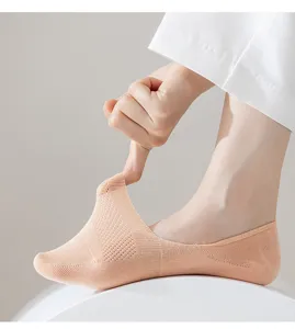 Detail shot of women summer breathable mesh invisible boat socks showing stretch and elasticity.
