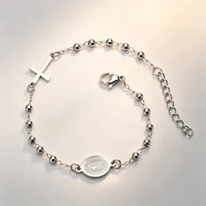 Detailed view of silver stainless steel bead bracelet with Cross and Virgin Mary medal