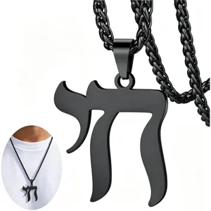 Close-up of black stainless steel Hebrew Chai pendant necklace on white background.
