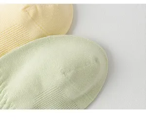 Close-up detail of women's breathable cotton mesh short socks, showcasing soft knit texture.