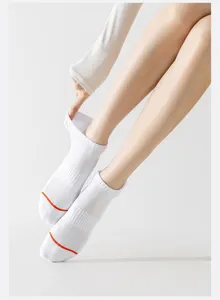 Detail view of professional athletic short socks featuring breathable mesh and comfortable towel sole.