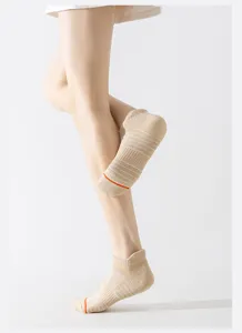 Women's athletic short running socks with breathable striped design and cushioned towel bottom.