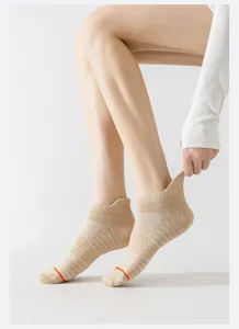 Detail view of breathable athletic running socks with towel sole, low-cut fit and tab.