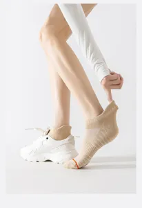 Women's athletic short socks, breathable mesh running socks with cushioned towel sole for sports.