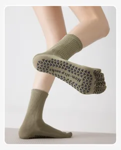 Comfortable non-slip five-toe yoga socks with silicone grip for pilates, fitness and floor workouts.