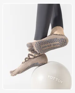 Anti-Rutsch Fünf-Zehen Yoga Socken mit Kreuzriemen, professionelle Pilates Socken Damen.