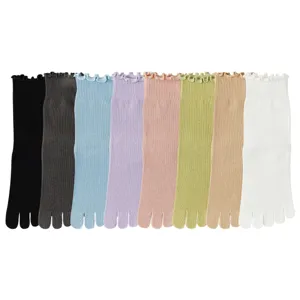 Women's yoga five finger socks non slip split toe mid calf hosiery multi color set.