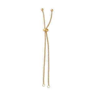 Close-up of golden stainless steel adjustable bolo bracelet chain component.