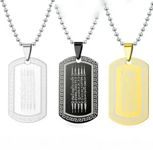 Detail of stainless steel dog tag necklaces in silver, black and gold with Thai script