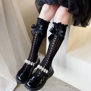 Girls black lace ruffle mesh socks with cute bow, breathable spring and summer detail view.