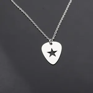 Detailed view of silver guitar pick necklace with hollow star design in punk style