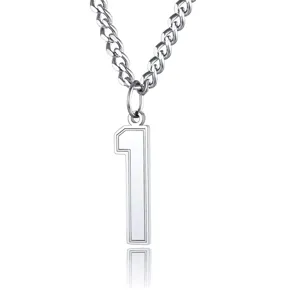 Close-up of stainless steel number 1 pendant necklace on Cuban chain with reflection