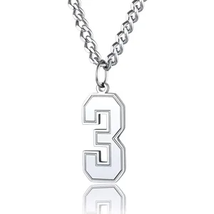 Detailed macro shot of a minimalist silver stainless steel number 3 pendant necklace