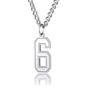 Close-up of stainless steel number 6 pendant with polished silver finish on chain
