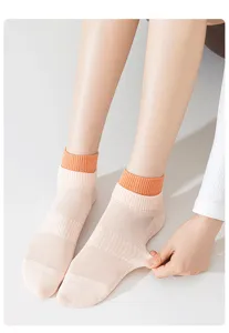 Women summer breathable mesh short socks with orange ribbed cuffs for daily sports and casual wear.
