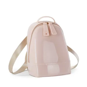 Detail view of pink glossy PVC mini shell backpack with gold-tone hardware straps.