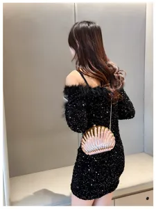 Elegant metallic pink shell-shaped chain evening bag shown on a model in a sequined dress.