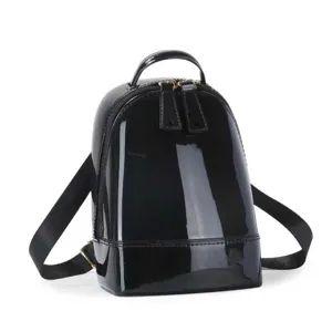 Glossy black PVC mini backpack with shell shape and sleek patent finish for women