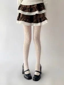 White French vintage floral hollow jacquard tights detail view for women summer daily wear.