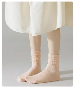 Chaussettes slouch unies mi-mollet pour femme, coton respirant décontracté, tricot doux.