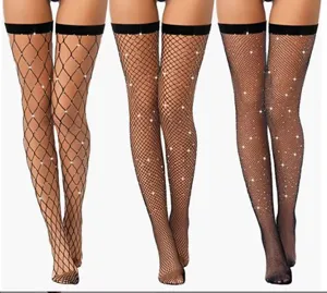 Close-up of sparkly rhinestone fishnet thigh high stockings, dazzling crystal mesh hosiery details.