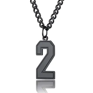 Close-up of matte black stainless steel necklace with football number 2 pendant