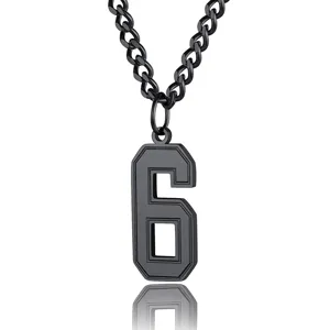 Macro view of black stainless steel necklace with jersey number 6 pendant