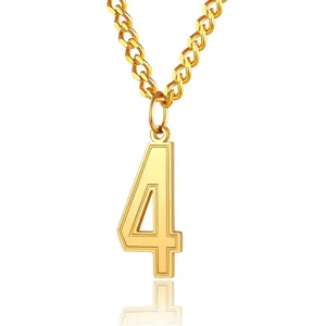 Detailed view of a gold-plated stainless steel number 4 pendant necklace with curb chain
