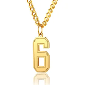 Detailed view of a shiny gold stainless steel necklace featuring a number 6 pendant