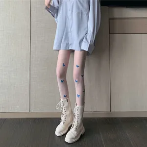 Sheer summer pantyhose with cute blue butterfly print, lightweight and stylish women leg wear detail.