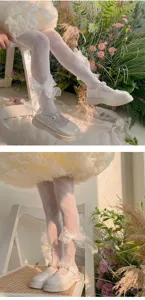 Collants de dentelle blanche mignons pour enfants avec nœuds en organza transparents et ravissants.